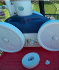 Idler Wheel Kit for Polaris Pool Cleaners C16 With Ball Bearing C60 Screw C55 And Washer C64 next to pool cleaner