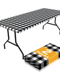 Waterproof Elastic Fitted 6Ft Picnic Table Cloth 2 Pack Buffalo Plaid Black White 30x72 Inches on metal table with folded pack