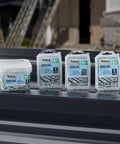 Heavy Duty Size 10 X 1 Inch Low Profile Standing Seam Metal Roofing Screws With Quick Bite Sharp Point For Fast Wood Deck Installations And Flush Pancake Head Design To Stop Dimples, 360 Pack displayed in clear containers.