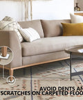 Hella Smooth Self Adhesive Furniture Sliders 16 Piece Set under a couch leg on carpet, protecting floors from scratches.