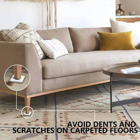 Hella Smooth Self Adhesive Furniture Sliders 16 Piece Set under a couch leg on carpet, protecting floors from scratches.