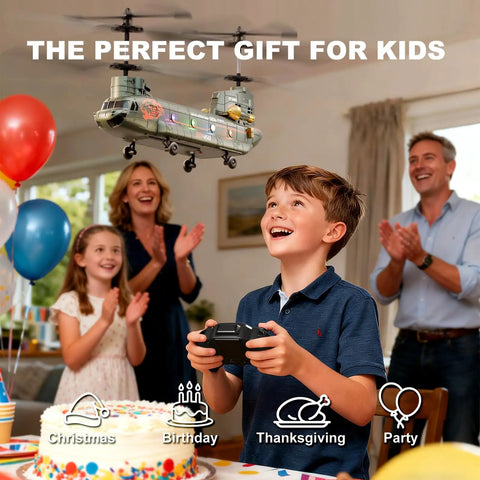 Boy playing with Remote Control Helicopter For Kids And Military Fans with altitude hold at party, family celebrating.