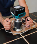 Lock Into Place With This Clear Acrylic Router Base Plate Six By Ten Inch with dual grip handles in use on a woodworking project.
