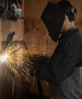 Heavy Duty Welding Cape Sleeve Made From Tough Split Cowhide Leather Flame Resistant Welder Jacket during welding with sparks.