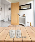 Beefy Iron Cabinet Catch And Latch Set For Suitcases Trunks And Toolboxes Twin Pack With Screws on wooden surface