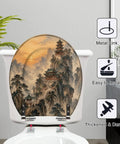 Round Mountain Temple Chinoiserie Sunrise Misty Chinese Ink Toilet Seat mounted on a toilet, showcasing its scenic design and metal hinges.