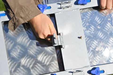 Adjusting lever of Beefy Durable Aluminum And Steel Dog Teeter Board With Rubber Skin Adjustable 21 To 27 Inches 12 Inch Wide