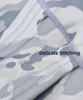 Close-up of stitching on Winter Balaclava Ski Mask for Men and Women, padded windproof full envelope face cover, camouflage design.