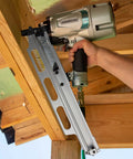 Top Shelf Pneumatic Framing Nailer With Smooth Operator Depth Tweaks and Heavy Duty Aluminum Magazine in use with wood.