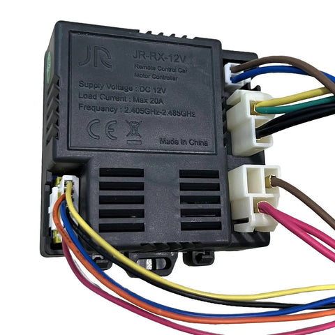 Close-up of JR-RX-12V receiver with wires for 12V Electric Car DIY Power Wheel Harness Kit With High Power Wires Switch Bluetooth Remote Box And Receiver For Replacement Parts Ride On Toy Car Accessories Easy Self Made Upgrade Kid Friendly.