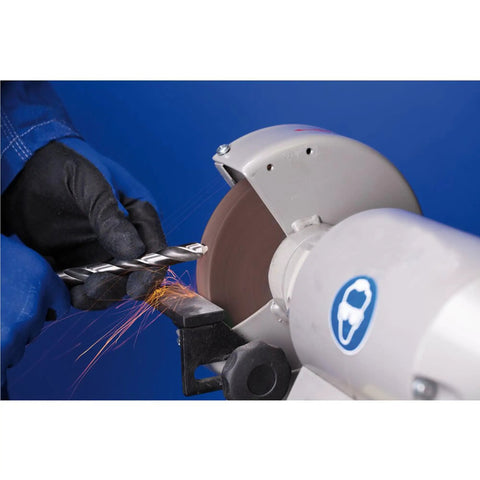 Person sharpening a drill bit on a Heavy Duty 6 Inch Vitrified Bench Grinding Wheel 60 Grit Thick Profile.