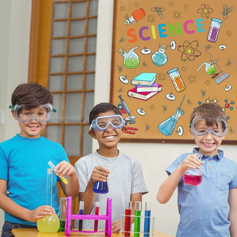 Children with goggles in front of colorful science lab wall decals for classroom and nursery, realistic test tubes and microscope stickers