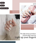 Hand with soft knit sweater showing nails painted with Six Piece 15ml Gel Polish Set In Black And White Non Toxic HEMA Free Kit