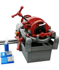 Electric Pipe Threader Workhorse One Half To Two Inch NPT With Twenty Eight RPM Threading Cutter Three In One Tool For Threading Cutting And Reaming Includes Clamping Device And Oiling System Built For Construction And Installation Jobs. red pipe threader with die set and oil can