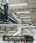 Warehouse illuminated by Two Pack 2Ft LED T8 Integrated Shop Light Fixture With 3500 Lm 6500K Daylight White Big Bright, 30W U Shape 300 Degree Beam, Garage Ceiling And Under Cabinet Light, Corded Electric On Off Switch