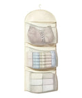 Game Changer Closet Suspending Organizer With Sturdy Metal Hanger And Three Tier Mesh Pockets For Dorm Rooms And Small Spaces To Keep All Items Neat And Tight, featuring three transparent mesh tiers for organized storage.