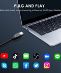 Close-up of a USB cable connected to a laptop, highlighting plug and play capability for 1080P HD Webcam With Built In Dual Mics And Noise Canceling Privacy Cover, 75 Degree FoV, Plug And Play USB Web Camera For PCs Laptops Desktops Macs Offering Crisp Video And Hassle Free Setup.