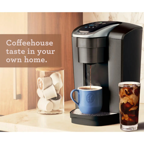 Kick Up Your Morning Routine With This Dope Single Serve Coffee Maker Featuring K Cup Compatibility Strong Brew And Iced Settings Programmable Temp Control Plus Multiple Cup Sizes In Solid Brushed Slate in use, brewing hot coffee and iced drink.
