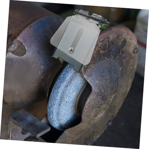 Beefed Up Heavy Duty Bench Grinder Shield Guard Plate on grinding machine, showcasing transparent stainless steel dust guard.