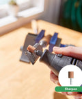 Heavy Duty Variable Speed Rotary Tool Kit With A Slick 1.2 Amp Motor and Smooth Airflow Cooling in use for sharpening an edge.
