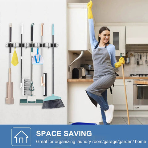 2 Pack Stainless Steel Wall Mount Broom Holder With 5 Racks And 4 Hooks Heavy Duty Self Adhesive Broom Organizer in kitchen