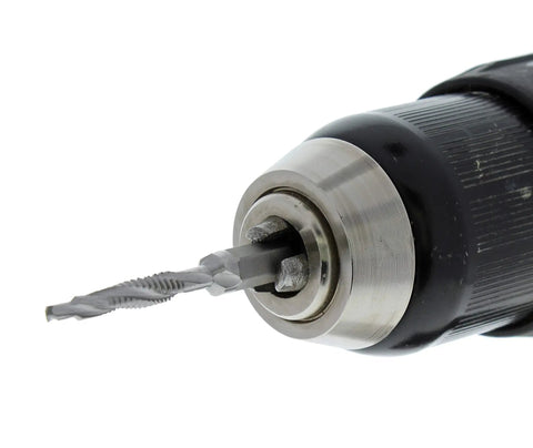 8 Piece Drill Tap Set With 1 Quarter Inch Hex Shank Pro Grade HSS Drill Bits in a drill, close-up of bit head.