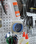 White Pegboard Organizer Kit With Hooks Bins And Cups, 48 By 24 Inch Wall Mount Panels displaying organized tools and supplies