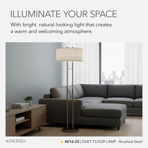 Brushed Steel Floor Lamp With Ivory Fabric Shade, Dual Pull Chain And Double Socket Design in modern living room setting