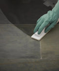 Application of Seal And Enhance Premium Sealing Solution For Stone And Tile Ready To Use Impregnator on dark stone surface