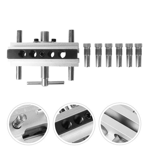 Top Shelf Self Centering Doweling Jig And Sharp Wood Drill Guide With Rugged Steel Bushings from a top view showing precision components.