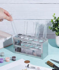 Person placing test tube in Stainless Steel 12 Hole Test Tube Rack 21mm Diameter Three Tier Lab Stand for Classroom and School Use
