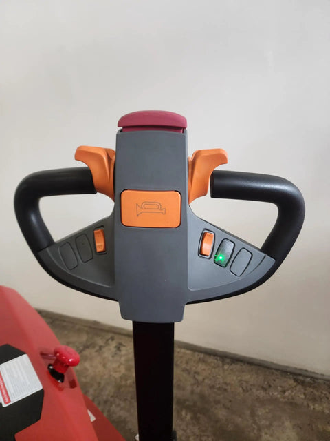 Built Tough Electric Pallet Stacker Packing 2600 Lbs Capacity Boasting Quick 118 Inch Lift Height control handle with buttons and LED indicator.