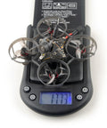 Grab This Snappy Micro Fpv Drone Built Different To Crush Tracks Fast Features Sixty Five Mm Frame One Cell Battery Elrs Receiver Four Hundred Mw Vtx And Brushless Motors on scale showing 17.73g weight.