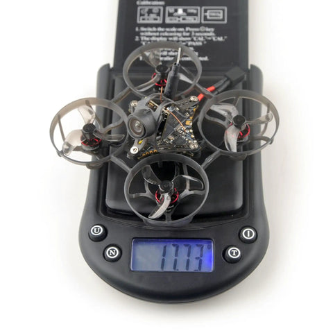 Grab This Snappy Micro Fpv Drone Built Different To Crush Tracks Fast Features Sixty Five Mm Frame One Cell Battery Elrs Receiver Four Hundred Mw Vtx And Brushless Motors on scale showing 17.73g weight.