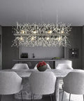 Dining room with Modern Crystal Firework Chandelier, Linear LED Pendant Light For Dining Room, Bedroom And Living Room, Chrome Dandelion Fixture, 12 Light, 35.5 Inch, Romantic Starry Sky Ambience, Lit Ultra Bright Glow