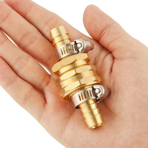 Hand holding Brass Garden Hose Repair Kit 2 Pack With Clamps 1/2 Inch Barb To 3/4 Inch GHT Adapters Fits 1/2 Inch Hoses