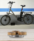 36T Copper Gear Set For Electric Bike Hub Motor Planetary System With Bearing And Copper Clutch Gear For E Bike Conversion Kit 38x38x12mm Built To Last Ride shown on table with bicycle in background