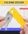 Close-up of yellow folding utility knife with extended steel blade.