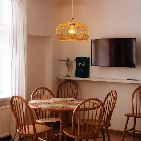 Hand Woven Rattan Pendant Light With Plug In Cord 15Ft Hemp Rope, On Off Switch, illuminating a dining area with warm ambient light
