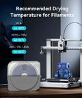 Filament Dryer Box S1 Plus With Built In Circulation Fan near 3D printer and temperature guide, grey for home and workshop use.
