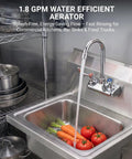Phivan 4" Wall Mount Brass Kitchen Sink Faucet, 3-1/2" Gooseneck Spout with water flow over vegetables in stainless steel sink.