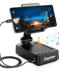 All In One Phone Stand With Bluetooth Speaker And Charging Dock 360 Degree Rotating HD Stereo Sound Built In Microphone Keeps Your Phone Juiced While You Watch Or Work Fits All Phones And Tablets Black displaying phone with media playing