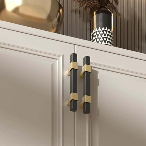 Premium Zinc Alloy Cabinet Pulls Measuring 3 Inches Long Arrive In A Solid 10 Pack Kit With A Dope Black And Gold Finish on cabinetry.