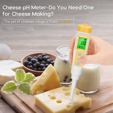 Using Food pH Meter For Sourdough And Bread Dough on cheese, displaying pH 5.56, with assorted cheeses in the background.