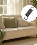 Pair Of Heavy Duty Steel Recliner Springs Featuring Half Inch Tension Coils on a couch, designed for swift furniture fixes.