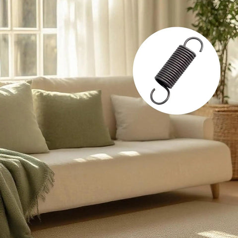 Pair Of Heavy Duty Steel Recliner Springs Featuring Half Inch Tension Coils on a couch, designed for swift furniture fixes.