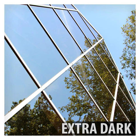 Very Dark Daytime Privacy Window Film with Heat Control Mirror Silver Tint on reflective glass in sunlight