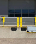 Heavy Duty Cantilever Dock Gate 12 Foot Wide Double Action Slick Pneumatic Struts in a warehouse loading bay setting.