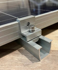 Heavy Duty Solar Panel Mounting Kit With Thickened Aluminum Rails And Durable Clamps For Outdoor Installations, close-up of clamp and rail.