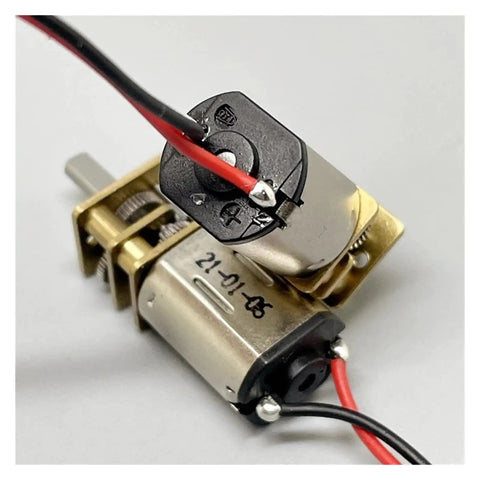 Close-up of Built Tough Ga12 N20 Full Metal Gearbox Electronic Starter Motor with wiring, ideal for DIY robot projects.